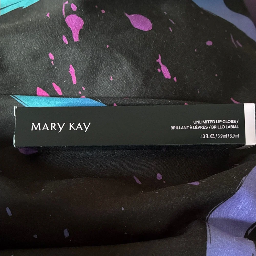 Mary Kay Unlimited Lip Gloss in Black and Purple Packaging - Picture 1 of 2